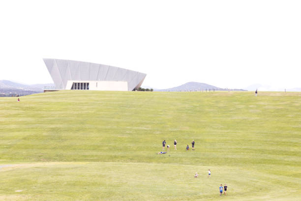 23/01/2025: Visitor walk the grass banks of the National Arboretum Canberra near the Margaret Whitlam Pavilion in Canberra, Australian Capitol Territory, Australia