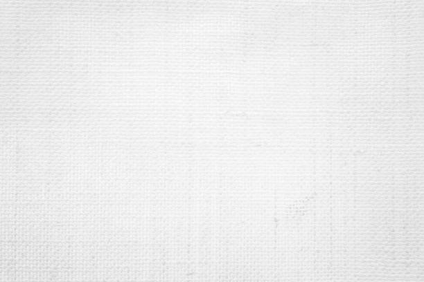 istock White color fabric canvas woven texture background in pattern light blank. Natural gauze linen, carpet wool and cotton cloth textile textured as clean empty for decoration text. Grey sack material. 2196471102