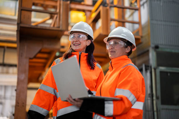 istock Workers and Industry. Women in Manufacturing and Infrastructure 2196471228