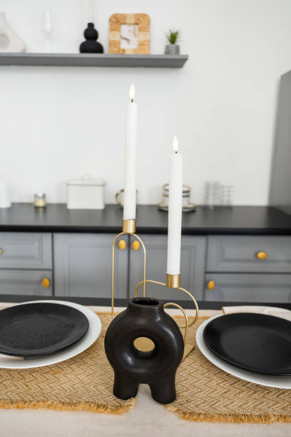 istock Elegant candle holder and decor setting in a modern kitchen space 2196471823