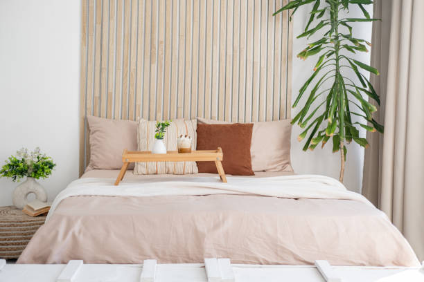 istock Cozy modern bedroom with natural elements and soft neutral colors 2196471837