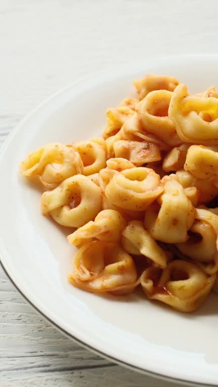 italy Tortellini pasta cooking in a plate close up