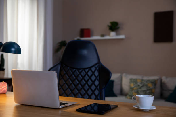 istock A modern home office featuring a laptop, creates a cozy and inviting atmosphere for productivity 2196477465