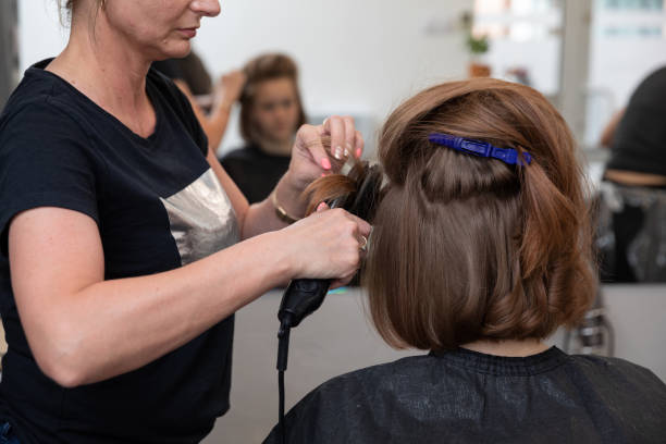 istock Experience a Professional Hair Styling Session at a Trendy, Modern Salon for All Your Needs 2196480821