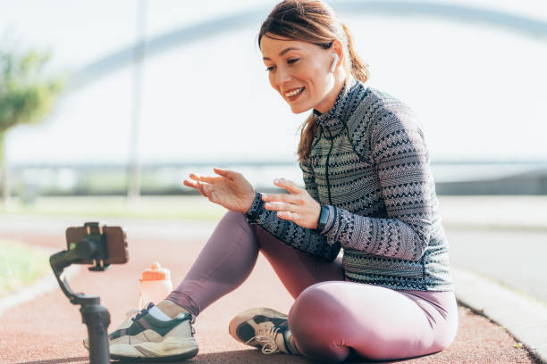 istock A female influencer recording sport vlog 2196482284