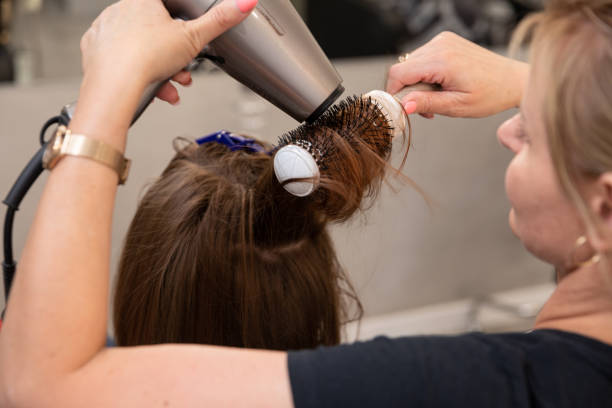 istock The detailed and Professional Hair Drying Process performed in a Salon Setting ensures excellence 2196483015