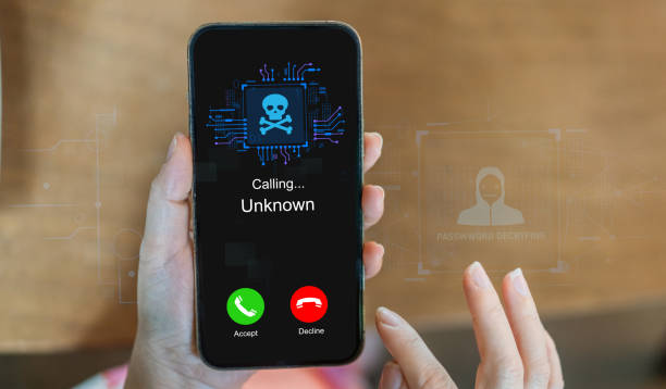 istock Phone scam alert with hacker and scammer calling unknown number, cybercrime, data theft, phishing attempt, fraud alert, digital security threat, cyber attack warning technology and crime concept 2196492317