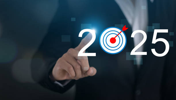 istock 2025 target projection on hand business strategy future planning, digital goals vision for success, arrow hitting the target, futuristic business concepts, corporate development, innovation and trends 2196492353