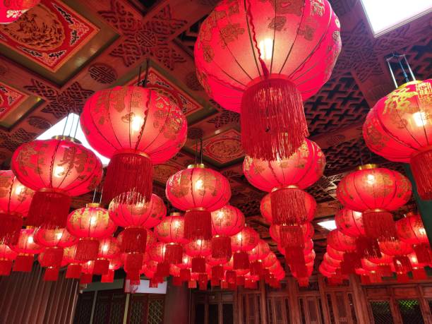 istock Red Lanterns: A captivating ceiling adorned with numerous vibrant red lanterns, casting a warm, festive glow. Perfect for adding an authentic touch to your projects related to Chinese New Year. 2196494034