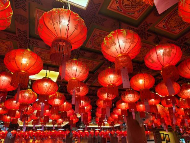 istock Red Lanterns: A captivating ceiling adorned with numerous vibrant red lanterns, casting a warm, festive glow. Perfect for adding an authentic touch to your projects related to Chinese New Year. 2196494035