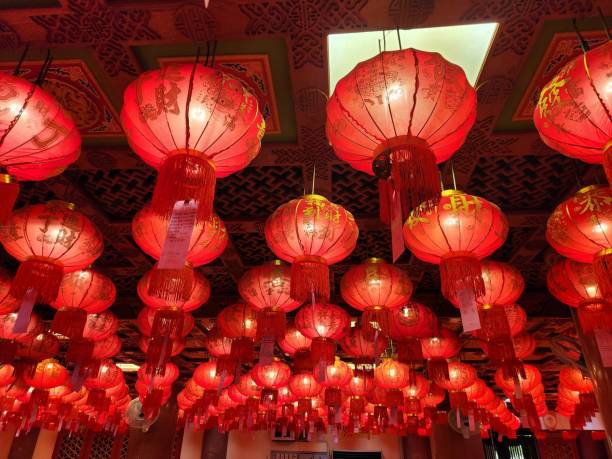 Red Lanterns of Celebration: A mesmerizing array of traditional red lanterns hang in a festive setting, casting a warm glow and creating an ambiance of celebration and good fortune.