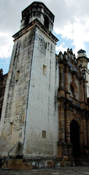 istock Magnificent colonial-era churches featuring baroque and Spanish Renaissance architecture, with ornate facades, towering bell towers, gilded altars, and intricate religious artwork, symbolizing Mexico's rich Catholic heritage. 2196494564