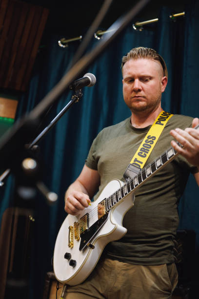 istock Guitarist playing in rehearsal space 2196495246