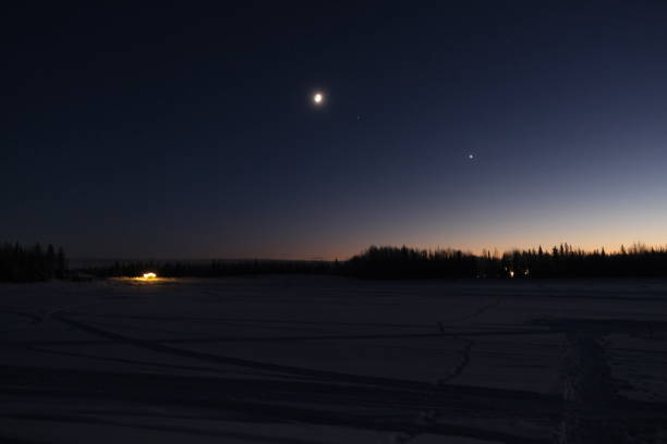 Frozen Chena Lake under night star sky in North pole Alaska