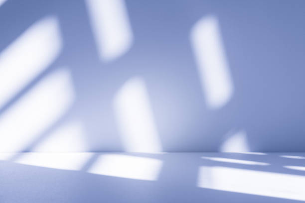 istock Studio style background wall decoration presentation uses white and blue tones. with shadows cast from a nearby window, concept creating a decorative 2196497015