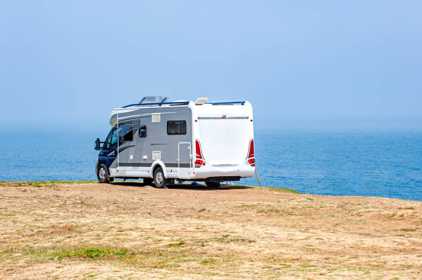 istock Caravan parked by the sea 2196497050