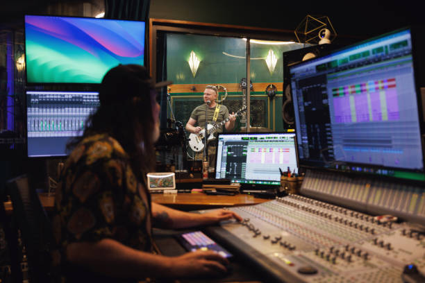 Sound engineer / music producer working in recording studio