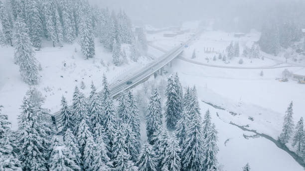istock Aerial view of icy highway intersection in snowstorm 2196500820