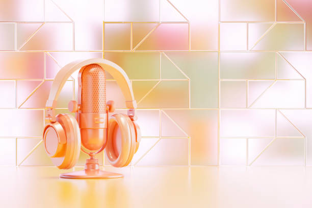 Microphone and headphones on white background.
