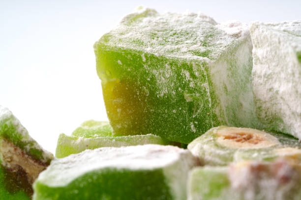 istock Delightful green sweets displayed with a light dusting of powdered sugar, emphasizing their unique texture and flavor 2196504196