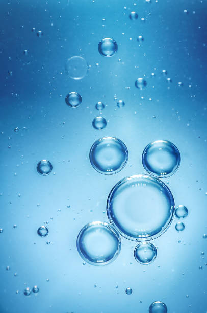istock rising air bubbles in clear blue water 2196506808