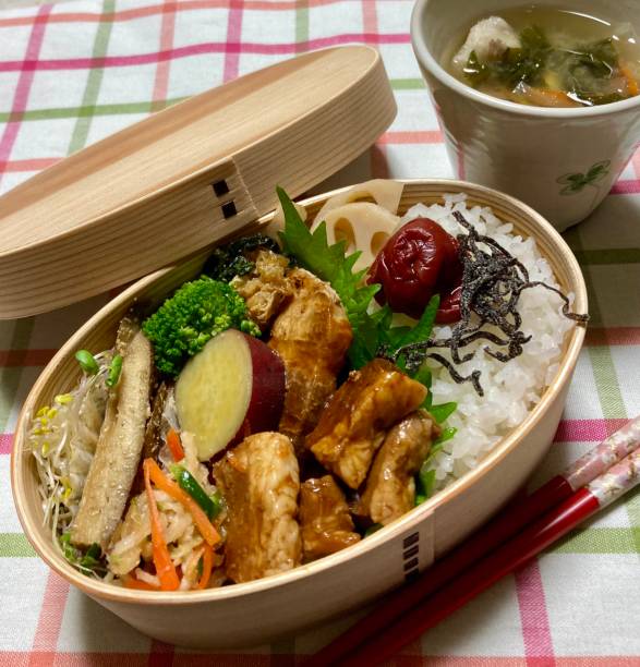 istock A traditional Korean dosirak, beautifully arranged with rice, assorted banchan, and savory proteins. Balanced and visually inviting, it’s a portable meal packed with vibrant flavors. 2196509263