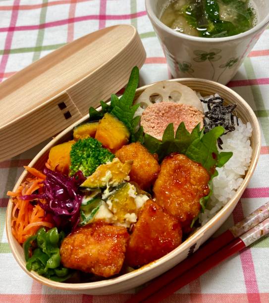 istock A traditional Korean dosirak, beautifully arranged with rice, assorted banchan, and savory proteins. Balanced and visually inviting, it’s a portable meal packed with vibrant flavors. 2196509444