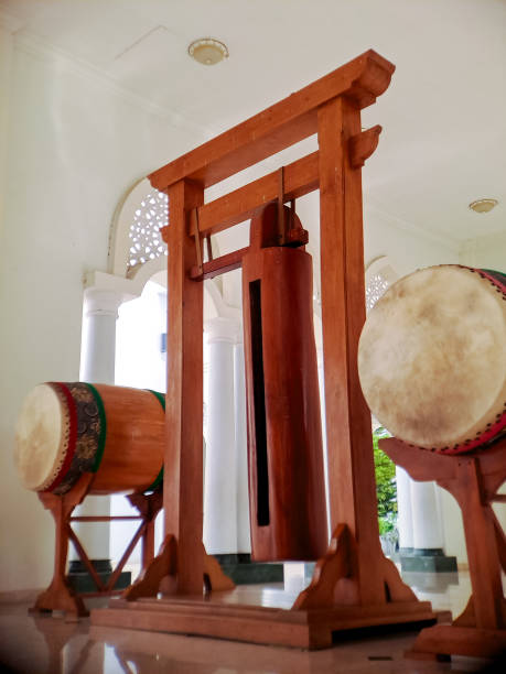 istock A large wooden gong hangs from a traditional frame, flanked by two large drums bedug inside a mosque. This photo captures the cultural and spiritual significance 2196515885