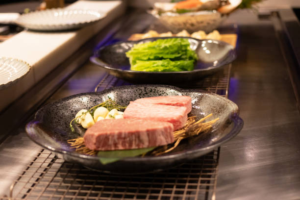 Delicious fresh ingredients on stone plates.
