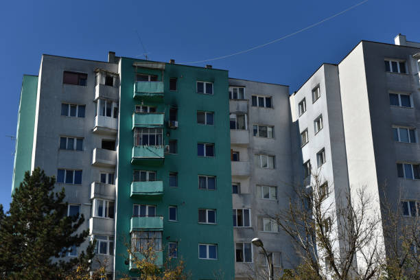 istock Typical facade of concrete panel building. Post Soviet flat of blocks 2196517160