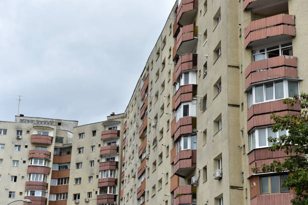 istock Typical facade of concrete panel building. Post Soviet flat of blocks 2196517166