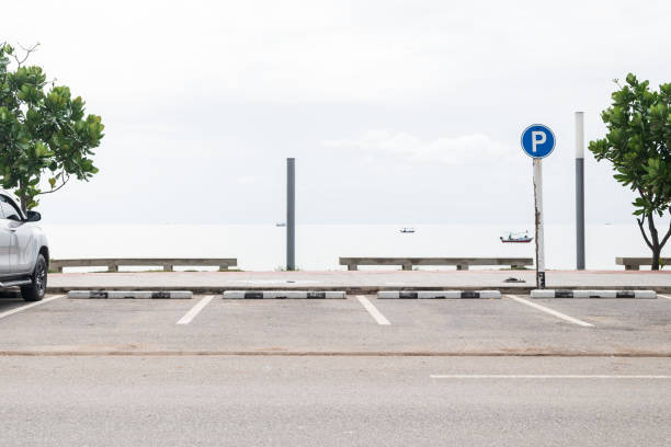 istock Empty parking lot against sea and beautiful sky. 2196518763