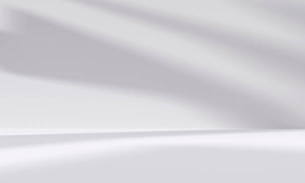 abstract white studio room with light and shadow from window background for product display presentation