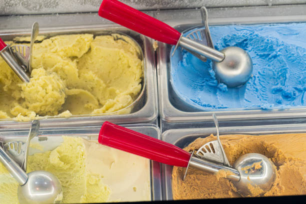 Close-up of ice cream in glass display window