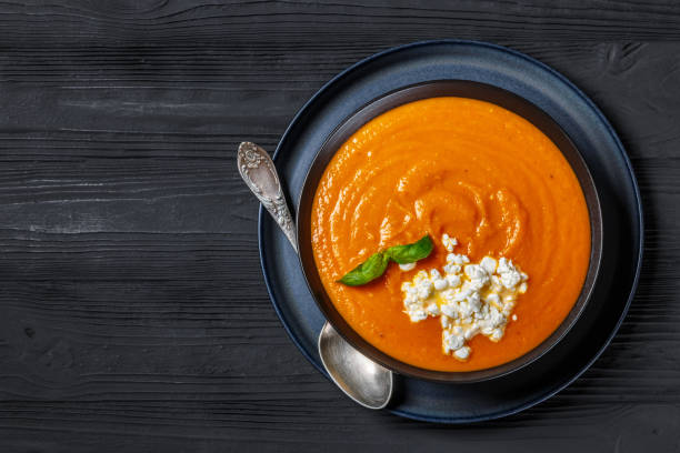 istock roast tomato soup in a bowl, top view 2196523270