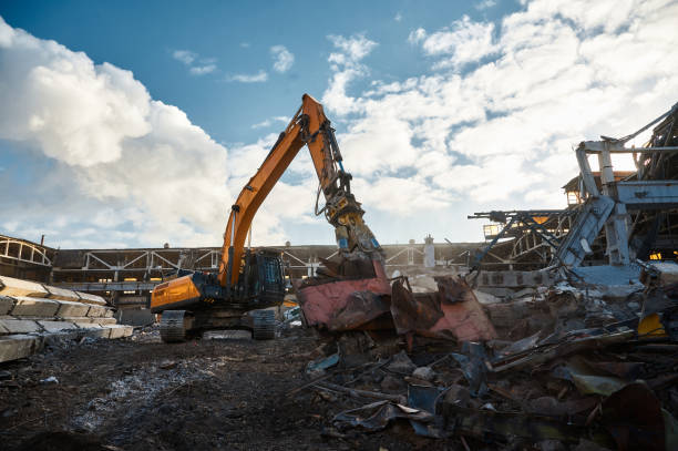 istock Excavator destroyer removes debris winter day 2196523817