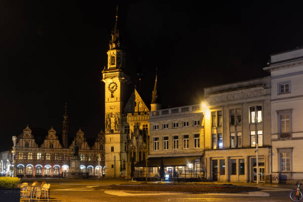 Night time view of the main market square (Grote Markt) in Aalst, East Flanders, Belgium. Copy space above.