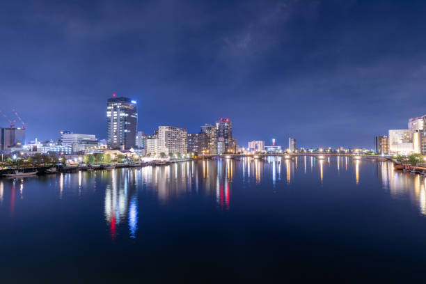 istock View of city lit up at night 2196527161