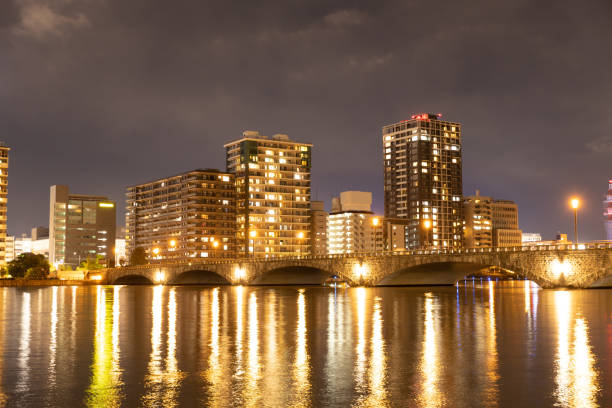 istock View of city lit up at night 2196527322