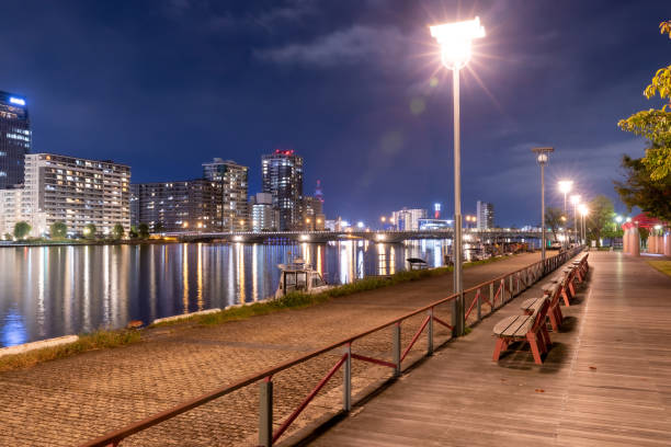 istock View of city lit up at night 2196527326