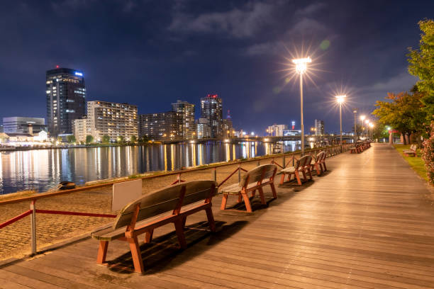 istock View of city lit up at night 2196527327