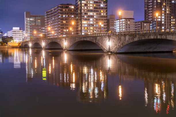 istock View of city lit up at night 2196527548
