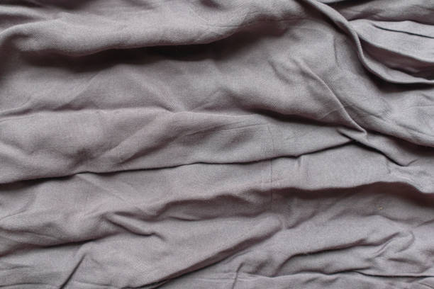 A crumpled gray cloth and and exposed to the light