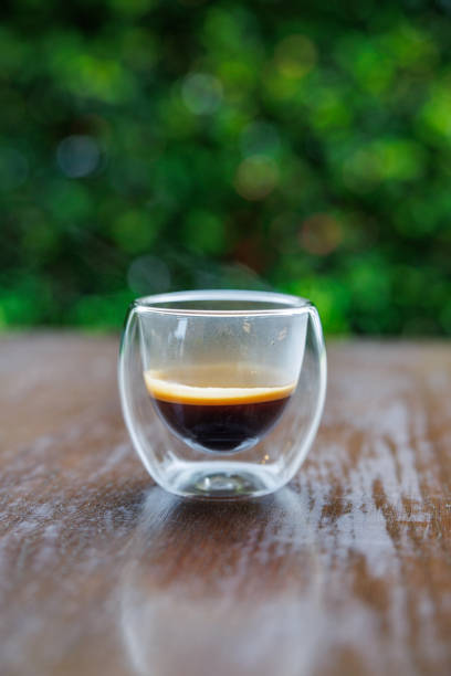 istock Transparent glass espresso cup on the table outdoors 2196531652