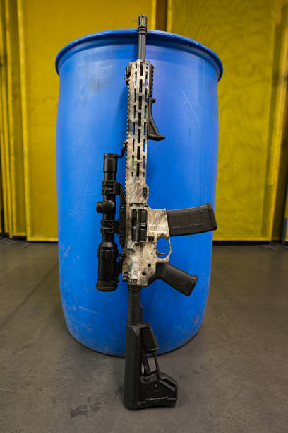 istock Very cool tactical sports rifle with optical sight in shooting range. 2196537659