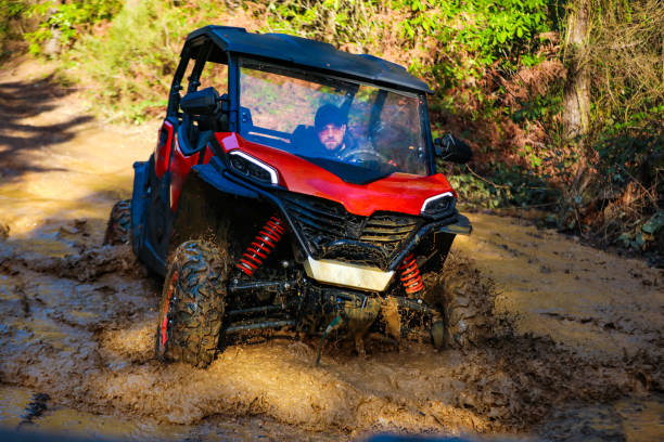 istock UTV Offroad Vehicle Racing in Hard Track With Mud Splash 2196538505