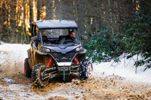 istock UTV Offroad Vehicle Racing in Hard Track With Mud Splash 2196538799