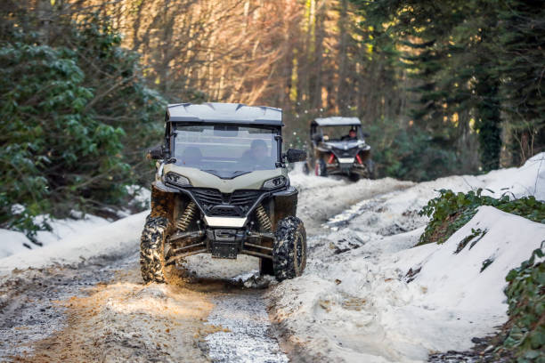 istock UTV Offroad Vehicle Racing in Hard Track With Mud Splash 2196539146