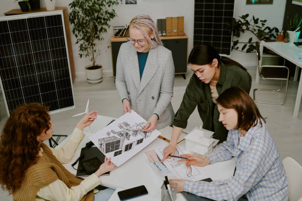 istock Collaborating on Sustainable Energy Project in Modern Office 2196539711