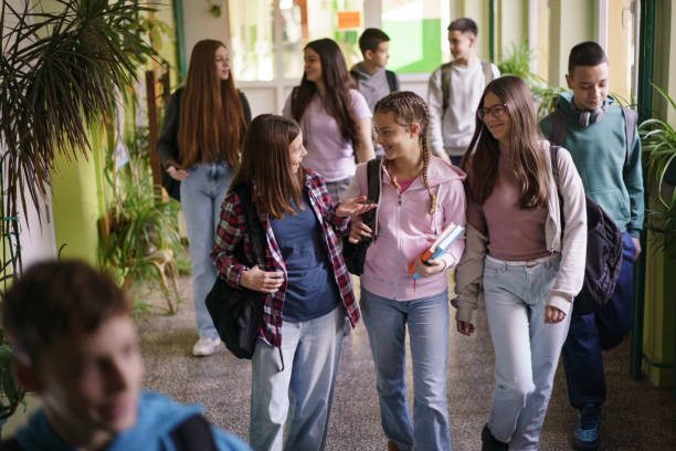 istock Children walk and talk as they leave school 2196539866